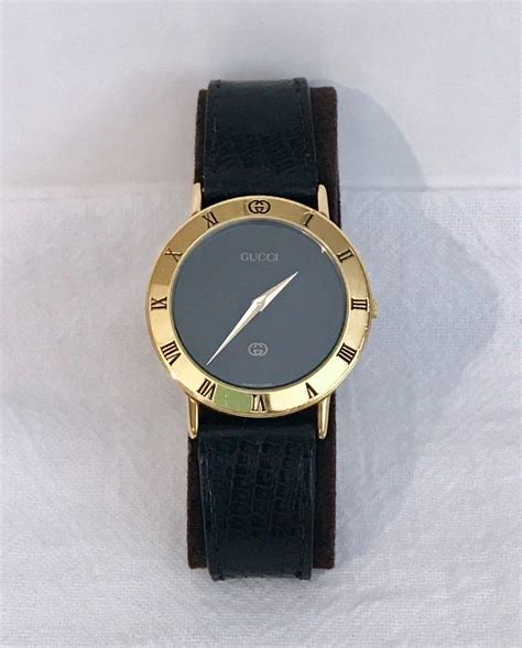 vintage gucci watch black face.